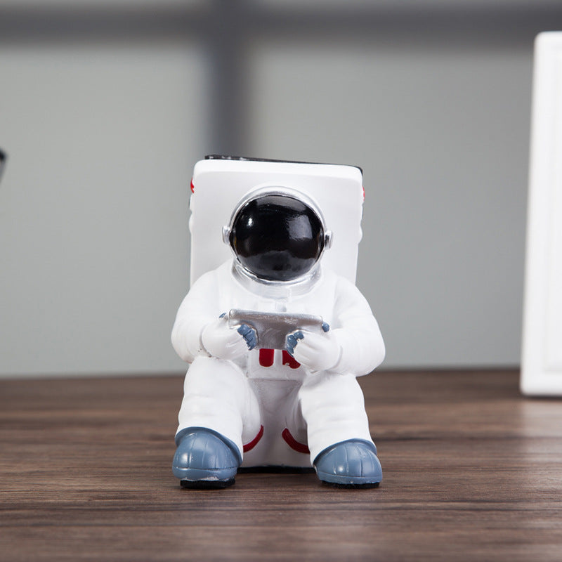 Space-Friendly: Astronaut Mobile Phone Stand